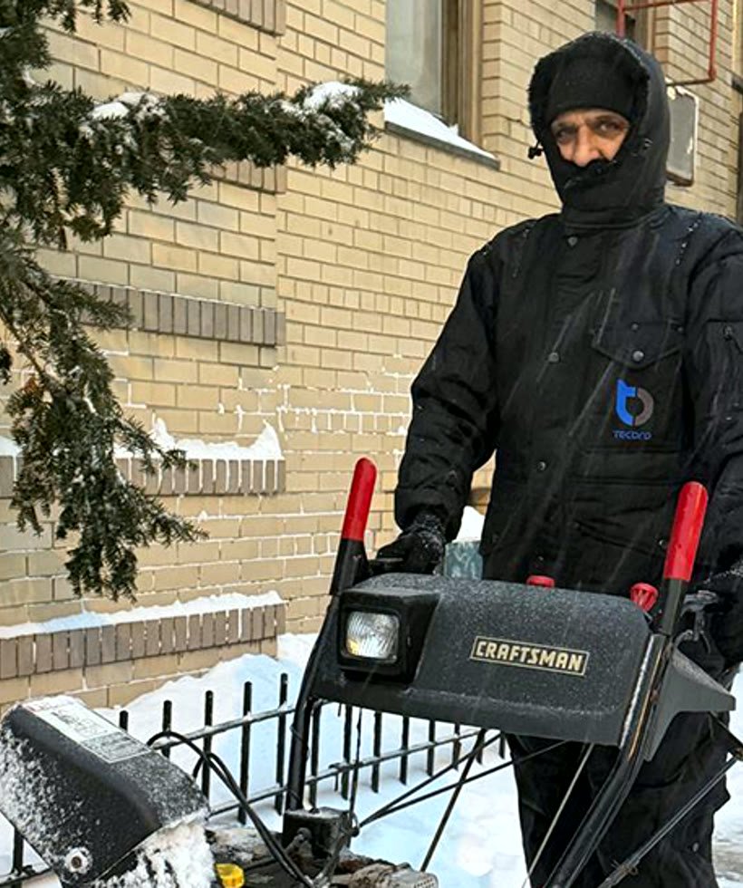 Tecbro worker on the job in a Chill-Bloc coverall